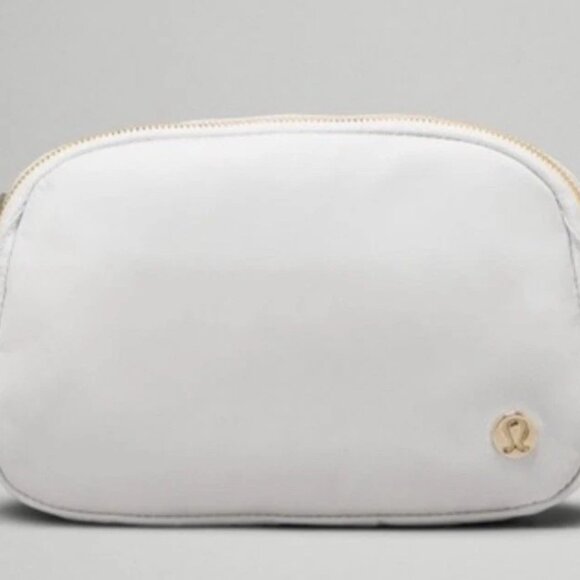 lululemon athletica Handbags - Lululemon Everywhere Belt Bag 1L Woodmark Color: White Opal/Raw Linen/Wh…